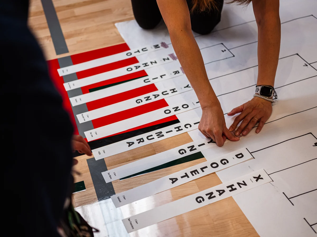 Placing competitor name tags onto a tournament bracket