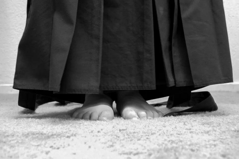 Step 2 of tying the hakama