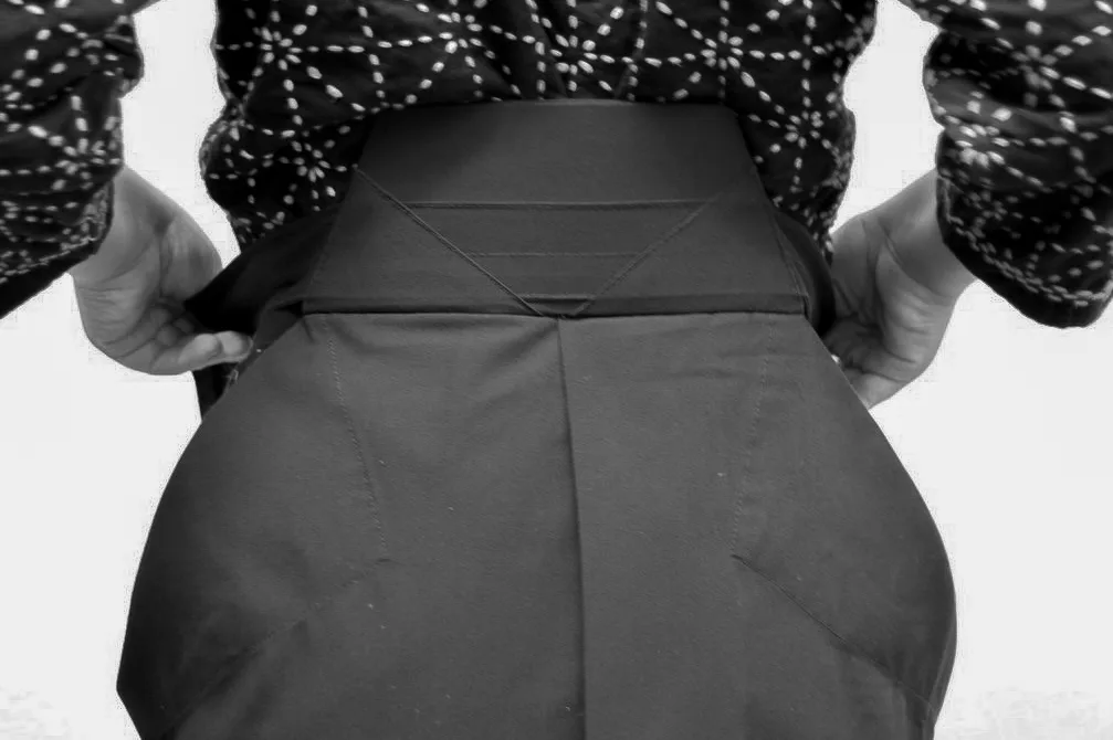 Step 13 of tying the hakama